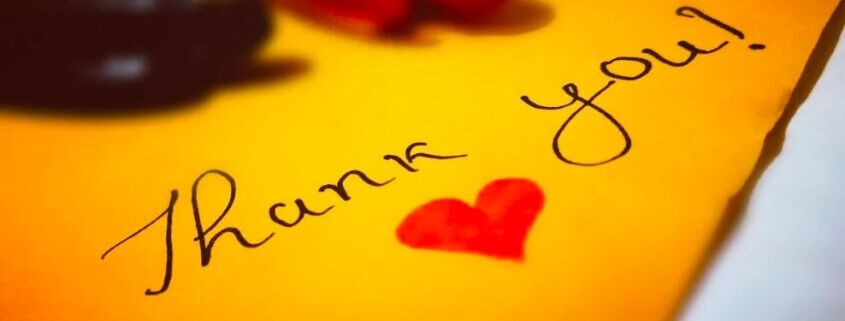 thank you note written on yellow paper